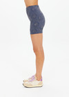THE UPSIDE women's navy jacquard Secretos 4inch High Spin Short is high-rise and offers a soft & supportive fit in a textured floral and metallic fabrication. Made for yoga & pilates.