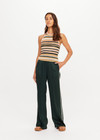 THE UPSIDE women's stripe Bohemia Sal Crochet Halter Top is true to size with a tie keyhole back and striped design in pink, tan, cream, and green. Made for lifestyle.