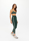 THE UPSIDE women's green Santa Fe 25inch Legging is soft, supportive with cream side seam and hem bindings, and side pockets. Made for yoga & pilates.