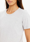 THE UPSIDE women's grey Joy Tee is slim fit in organic cotton jersey with soft ribbed neckline and embroidered horseshoe logo at front chest. Made for lifestyle.