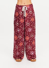 THE UPSIDE women's maroon Miri Kato silk wide-leg pant is designed for an oversized fit and features a gathered front waist with cream plaited drawcord. Made for lifestyle.