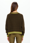 THE UPSIDE women's olive organic cotton Castilla Clementine Knit Crew is designed for a relaxed fit and features a high V neckline with lime-striped rib. Made for lifestyle.