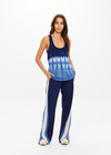 THE UPSIDE women's tie dye organic cotton Seeker Emma Knitted Tank Top is designed for a regular fit and features a tonal ribbed neckline and armholes. Made for lifestyle.