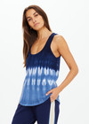 THE UPSIDE women's tie dye organic cotton Seeker Emma Knitted Tank Top is designed for a regular fit and features a tonal ribbed neckline and armholes. Made for lifestyle.
