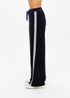 THE UPSIDE women's navy polka dot Spellbound Roma Pant is true to size and features metallic silver spots on velvet fabrication and side seam pockets. Made for lifestyle.