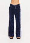 THE UPSIDE women's navy Galaxia Loretta Pant is designed for a mid to low rise fit and features elasticated waistband, drawcord with side seam pockets and knitted tape down sides. Made for lifestyle.