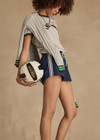 THE UPSIDE women's navy Galaxia Marcella Short is designed for a mid to low rise fit and features elasticated waistband, drawcord with side seam pockets. Made for lifestyle.