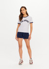 THE UPSIDE women's grey organic cotton Jarama Joy Tee features contrast navy binds on neck and sleeves and The Upside logo on front chest. Made for everyday leisure.