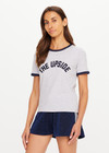 THE UPSIDE women's grey organic cotton Jarama Joy Tee features contrast navy binds on neck and sleeves and The Upside logo on front chest. Made for everyday leisure.