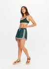 THE UPSIDE women's green Klio Short is designed for a mid-rise, relaxed fit and features a soft elasticated waistband with drawcord and contrast binds in cream along curved hem. Made for everyday.