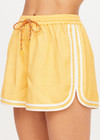THE UPSIDE women's yellow Klio Short is designed for a mid-rise, relaxed fit and features a soft elasticated waistband with drawcord and contrast binds in cream along curved hem. Made for everyday.