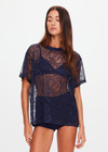 THE UPSIDE women's navy Memento Lace Sammi Tee is designed to be sheer, oversized and can be paired with the Capri Bra for coverage. Made for lifestyle.