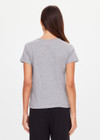 THE UPSIDE women's grey organic cotton Avalon Crew Neck Baby Tee is a everyday staple made from soft organic cotton jersey and finished with an embroidered arrow logo at back. The perfect everyday tee, made to last.