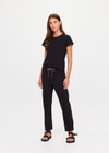 THE UPSIDE women's black organic cotton Avalon Crew Neck Baby Tee is a everyday staple made from soft organic cotton jersey and finished with an embroidered arrow logo at back. The perfect everyday tee, made to last.