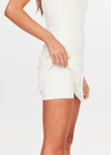 THE UPSIDE women's cream Lyon Pia Racerback Dress is a fitted stretch lace tennis dress with a high neck, A-line skirt and internal bodysuit with inner shorts and pockets. Made for tennis, golf & pickleball.