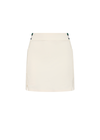 THE UPSIDE women's cream recycled soft peached Courtship Becket Mini Skirt is a panelled tennis skirt featuring an internal short external pockets with contrast striped elastic detailing at waistband. Made for tennis, gold & pickleball.