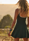 THE UPSIDE women's green recycled soft peached Racquet Maxine Mini Dress features a square neckline with contrast cream binds, an internal shelf bra and built-in shorts with pockets. Made for tennis, golf & pickleball.