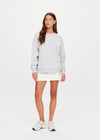 THE UPSIDE women's grey organic cotton Racquet Coolum Crew is an oversized fit with small split at side hem and discreet side pockets. Made for tennis, golf & pickleball.