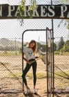 THE UPSIDE women's grey organic cotton jersey Racquet Casey Tee is a regular fit with a green printed racquet logo on front chest. Made for tennis, golf & pickleball.