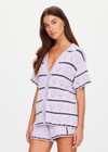 THE UPSIDE women's lilac organic cotton Amara Amayah Knit Shirt is a relaxed fit and features an open knit heart design and pearlised shell buttons. Made for tennis, golf & pickleball.