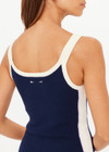 THE UPSIDE women's navy organic cotton blend Lori Knit Mini Dress features a scoop neckline with cream and lilac panels down sides and at hem. Made for tennis, golf & pickleball.