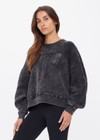 THE UPSIDE women's washed black Cosmic Paloma Crew is an oversized fit with a drop shoulder crafted from heavy organic cotton brushed fleece. Made for everyday.