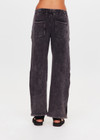THE UPSIDE women's washed black Cosmic Wide Leg Shana Pant is a high waisted, wide-leg fit and features silver metal button snaps down leg that can be worn open.