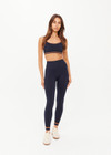 THE UPSIDE women's navy Form Seamless 25inch Legging is firm and supportive and features contrast tan stripes. Made for yoga & pilates.
