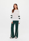 THE UPSIDE women's cream organic cotton Fenway Sebastian Crew offers a relaxed fit and features The Upside logo knit detail on back in green. Made for lifestyle.