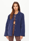 THE UPSIDE women's navy Levi Reversible Quilted Jacket is designed for a relaxed fit and features welt pockets, magnectic snap closure and a water resistant coating on black quilting. The perfect outerwear piece.