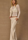 THE UPSIDE women's cream Navar Marnie Wide Leg Pant is a high-rise wide leg fit in our castilla "TU" design and features an elasticated waistband and side seam pockets. Made for everyday wear.