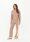 THE UPSIDE women's mocha Veneto Kansas Knit Pant is a wide-leg fit with a soft elastic waistband and short splits at hem. Made for lifestyle.