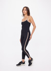 THE UPSIDE women's black recycled rib Rhythm 25inch Legging has a mid-rise fit and features cream and mocha binds along side seams. Made for yoga & pilates.