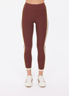 THE UPSIDE women's brown recycled rib Rhythm 25inch Legging has a mid-rise fit and features cream and yellow binds along side seams. Made for yoga & pilates.