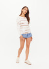 THE UPSIDE women's organic cotton rib Ayla Chrissy Long Sleeve Top is designed for a slim fit and features a brown hand tie dye design on a cream base. Made for lifestyle.