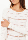 THE UPSIDE women's organic cotton rib Ayla Chrissy Long Sleeve Top is designed for a slim fit and features a brown hand tie dye design on a cream base. Made for lifestyle.