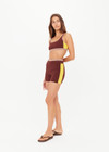THE UPSIDE women's brown Montage Rory Scoop Knit Sports Bra features a scooped neckline with mid coverage and yellow side pannels. Made for yoga & pilates.