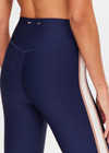 THE UPSIDE women's navy eco tech Toscan 25inch High Legging features a high-rise, breathable design with contrast mocha and cream binds along side seam. Made for yoga & pilates.