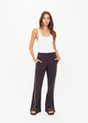 THE UPSIDE women's black Petra Flare Pant features soft, flared fabrication with grey splits at hem, side seam pockets and an elasticated waist. Made for lifestyle.