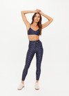 THE UPSIDE women's blue Bellaire 25Inch Legging features a cream star print with a mid rise design, tan striped drawcord and a supersoft recycled fabrication. Made for yoga & pilates.