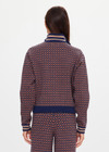 THE UPSIDE women's brown organic cotton Lumiere Margot Knit Jacket is a knitted long sleeve with a geometric star pattern, front pockets and contrast stripes around the sleeves. Made for lifestyle.