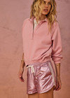 THE UPSIDE women's pink organic cotton french terry McGrath Collared Elle Polo is a relaxed, long sleeve polo with a collar and front buttons. Made for lifestyle.