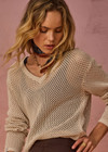THE UPSIDE women's creme organic cotton Josephine V Neck Knit features a lightweight relaxed shape with a deep V neckline and mini ribbed hem, neckline and cuffs. Made for lifestyle.