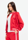 THE UPSIDE women's red 100% silk Two Hearts Silk Bomber Jacket is fully lined with cream and red stripes, welt pockets with triangle detail at top and bottom and an embroidered horse and horseshoe design. Made for lifestyle.