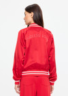 THE UPSIDE women's red 100% silk Two Hearts Silk Bomber Jacket is fully lined with cream and red stripes, welt pockets with triangle detail at top and bottom and an embroidered horse and horseshoe design. Made for lifestyle.