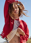 THE UPSIDE women's red 100% silk Two Hearts Silk Bomber Jacket is fully lined with cream and red stripes, welt pockets with triangle detail at top and bottom and an embroidered horse and horseshoe design. Made for lifestyle.