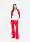 THE UPSIDE women's cream 100% organic cotton Take Me To The Ball Park Top features a soft ribbed neckline with contrast red 3/4 length sleeves. Made for lifestyle.