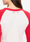 THE UPSIDE women's cream 100% organic cotton Take Me To The Ball Park Top features a soft ribbed neckline with contrast red 3/4 length sleeves. Made for lifestyle.