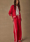 THE UPSIDE women's red When In Roma Holiday Pant is high waisted with an elasticated waistband, made from double faced single jersey fabrication with cream mesh tape along side seams. Made for lifestyle.