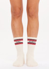 THE UPSIDE women's cream Two Hearts Crew Sock features jacquard stripes in red and burgundy and two black hearts on the ankle. Made for lifestyle.